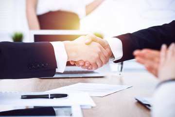 Business people shaking hands at meeting or negotiation in the office. Handshake concept. Partners are satisfied because signing contract