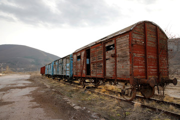 Old train wagons in an abandoned station