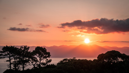 Obraz premium Sunrise at Sao Jorge Island, seen from Pico island at the Azores, Portugal