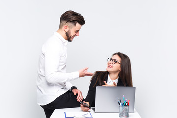 Two young employee work with new business plan. They are very happy. White background.