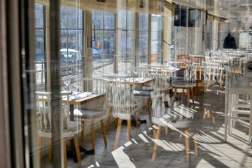 tables and chairs in restaurant