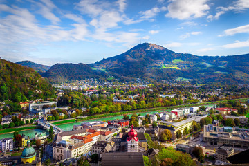 Scenic view opening from Hohensalzburg fortress in Salzburg to the city and Alps, Austria