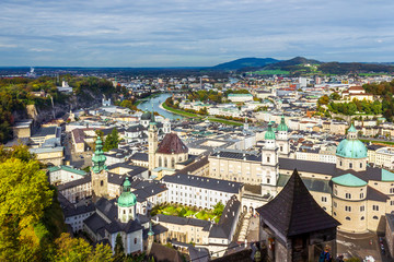 Fototapeta na wymiar Scenic view opening from Hohensalzburg fortress in Salzburg to the city and Alps, Austria