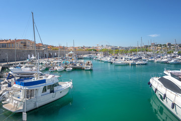 View on Port Vauban in the French town of Antibes with Fort Carre in the background