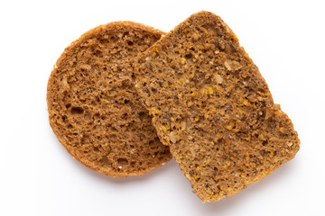 Rye bread slice on a white background.