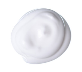 White cosmetic cream texture on white background isolation, top view