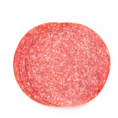 Salami slices on white background.
