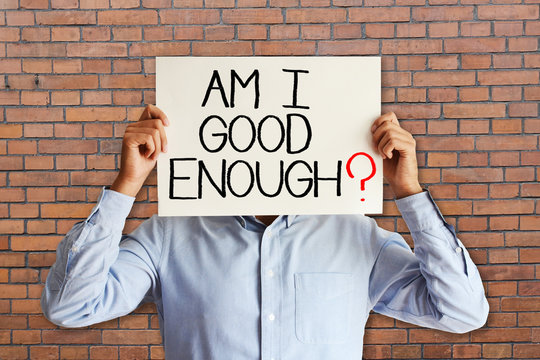 Young businessman asking “am I good enough”