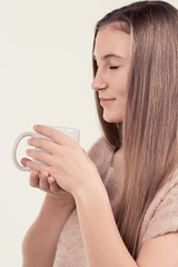 girl with a cup of tea and coffee
