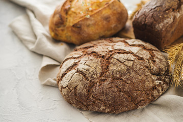 Assortment of freshly baked loaf of bread. Home bakery. Homebaked bread