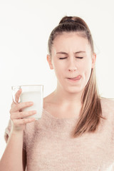 girl drinks milk and is happy