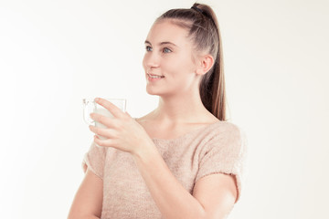 Obraz na płótnie Canvas girl drinks milk and is happy