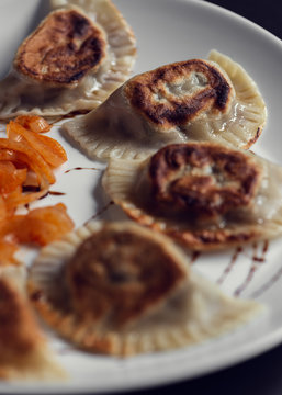 Pierogi de carna con salsa c&iacute;trica