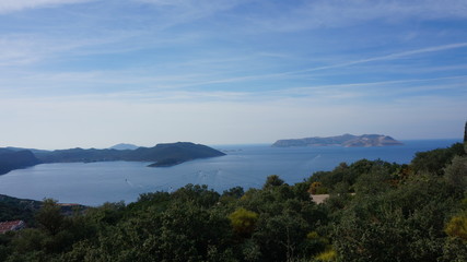 View over the sea and a town from a mountain above