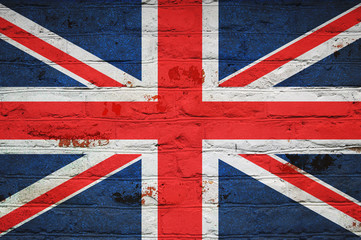 British flag on brick wall background. Wallpaper for installation and design. Space for text.