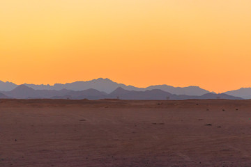 Fototapeta na wymiar View of the Arabian desert in Egypt at sunset