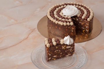 Biscuits chocolate cake with white and brown candies