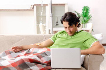 Young man suffering at home 