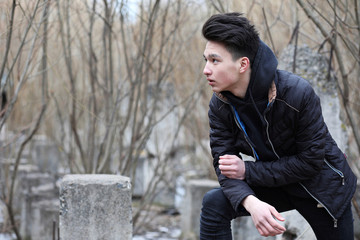 Fototapeta na wymiar Asian boy teenager in nature