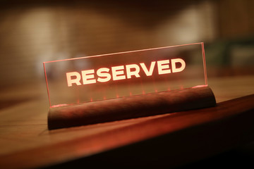 Glowing Sign Reserved at nigt