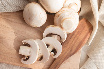 fresh mushrooms on a chopping board