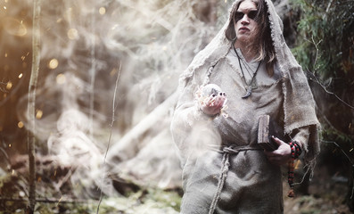 Fairy magician. A sorcerer with a glass sphere, a magical spell and a ritual. Elder with a staff...