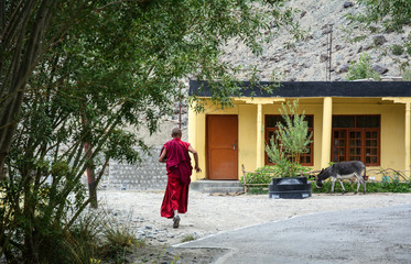 Fototapeta na wymiar A monk at ancient Tibetan temple
