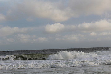 waves breaking on the beach