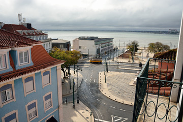 Fototapeta premium Yellow tram on the square in Lisbon