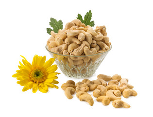 cashew nuts in glass bowl on white background