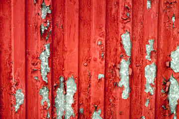 metal red fence with debris and scuffs is the fashion trend of today for building design