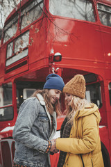 Happy beloved hipster man and lady on street