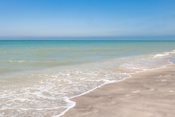 Florida beach looking into the Gulf of Mexico during a clear day