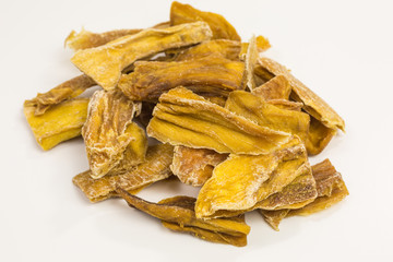 heap of dried mango pieces