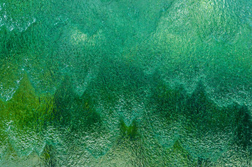 Falling water green and emerald background