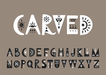 Vector display white uppercase alphabet decorated with black  folk patterns © struvictory