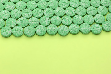 Medical colorful pills, capsules or supplements for the treatment and health care. Creative idea. Drugs. Sad. Die. Illness.