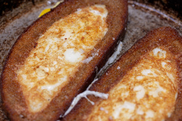 Fried eggs in bread crust on both sides