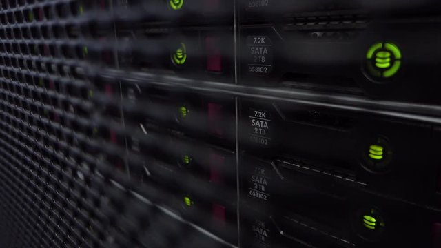 Data Servers While Working. HDD Racks. Server close up. Modern datacenter.