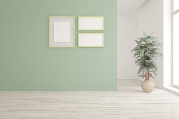 Fototapeta na wymiar Mock up of white stylish minimalist room with green flower and frames on a wall. Scandinavian interior design. 3D illustration