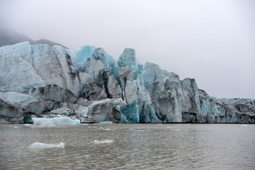 Icebergs in Jokulsarlon beautiful glacial lagoon in Iceland. Jokulsarlon is a famous travel destination in Vatnajokull National Park,  Iceland,