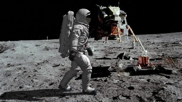 Astronaut walking on the moon.