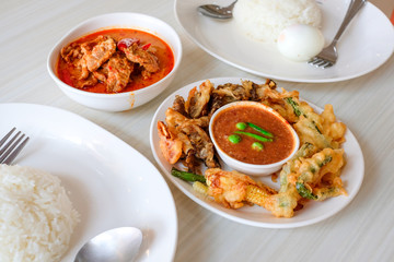 Main meal: steamed rice & Spicy shrimp paste (Nam Prik Kapi) , is this pair with batter-fried vegetables served with panang curry with pork.