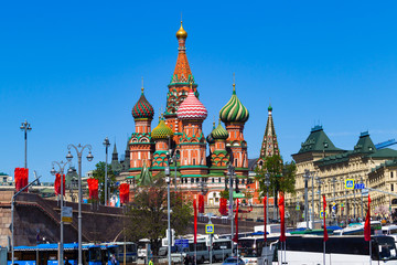 Obraz premium Moscow, Russia, May 9, holiday, Red Square, Vasilyevsky Descent and the Cathedral of Christ the Savior from the embankment. Decorated with flags of Moscow.