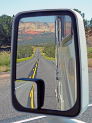Highway seen in the mirror of RV in Nevada, USA
