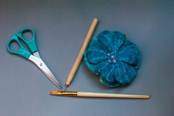 Hand made tools. Craft items on grey background.