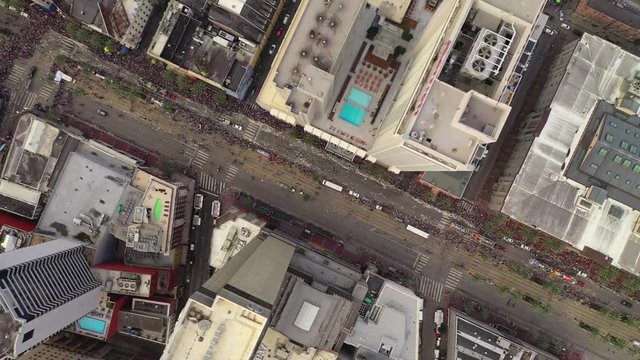 Aerial Overhead Downward View of Buildings in Downtown New Orleans during a parade