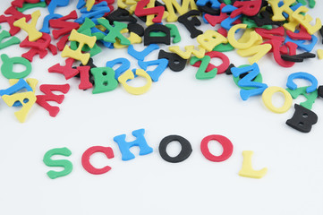 SCHOOL spelled out with colorful sponge rubber letters