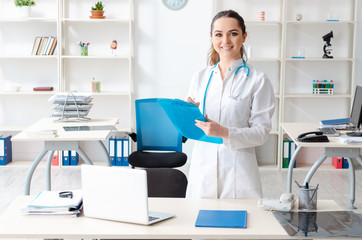 Young female doctor working in the clinic