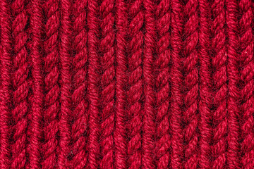 red knitted wool background. textile pattern